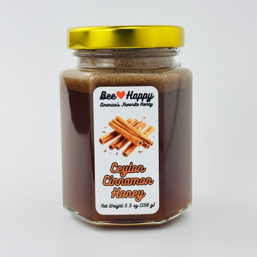 5.5 oz jar of Ceylon Cinnamon Honey on a white background