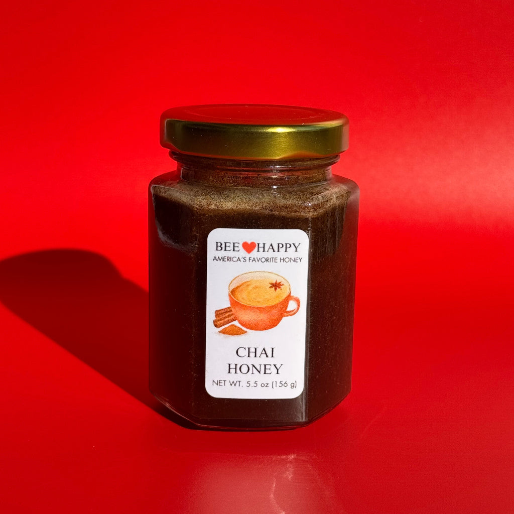 5.5 oz jar of Chai Honey on a red background