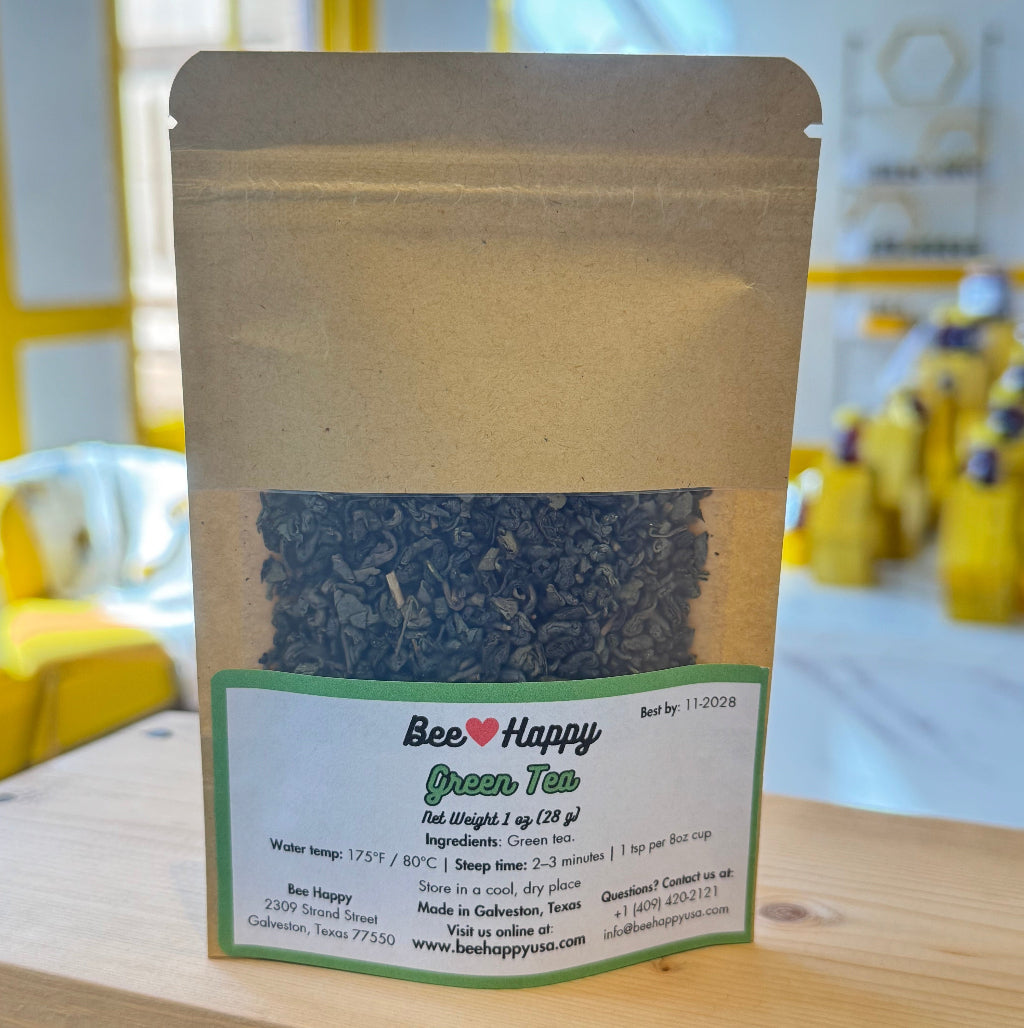 1 oz bag of green tea on a wooden surface