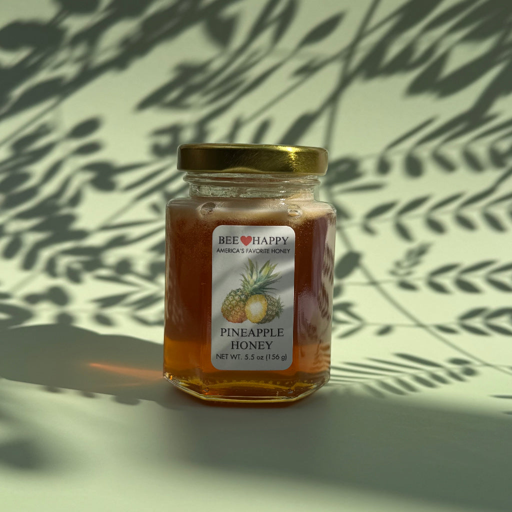 5.5 oz jar of Pineapple Honey against a light background
