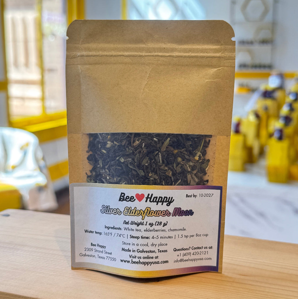 1 oz bag of Silver Elderflower Moon tea on a wooden surface